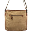 Brown leather and canvas handbag with a shoulder strap on a white background