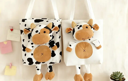 Two cow plushy totes