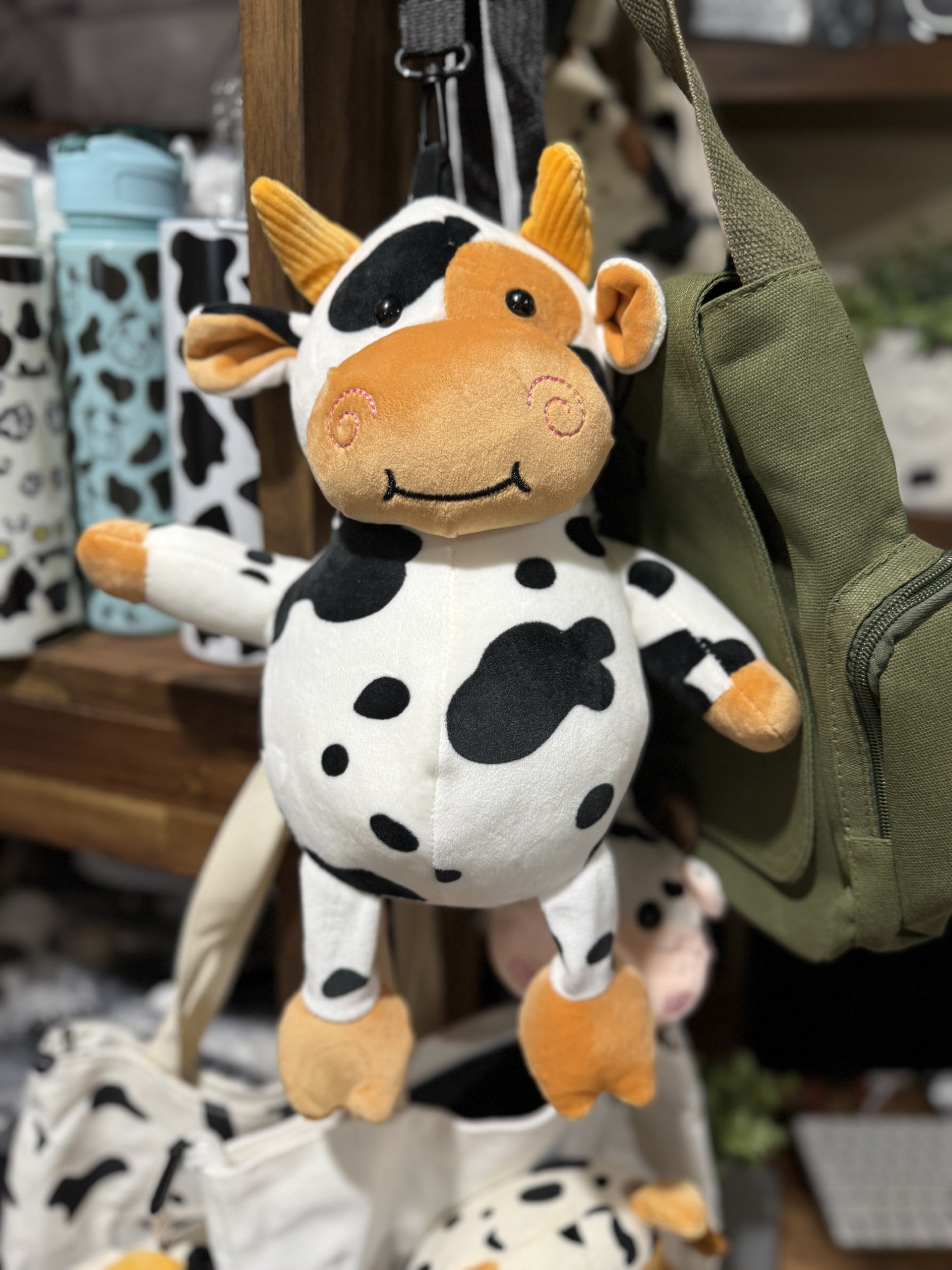A cow plushy backpack
