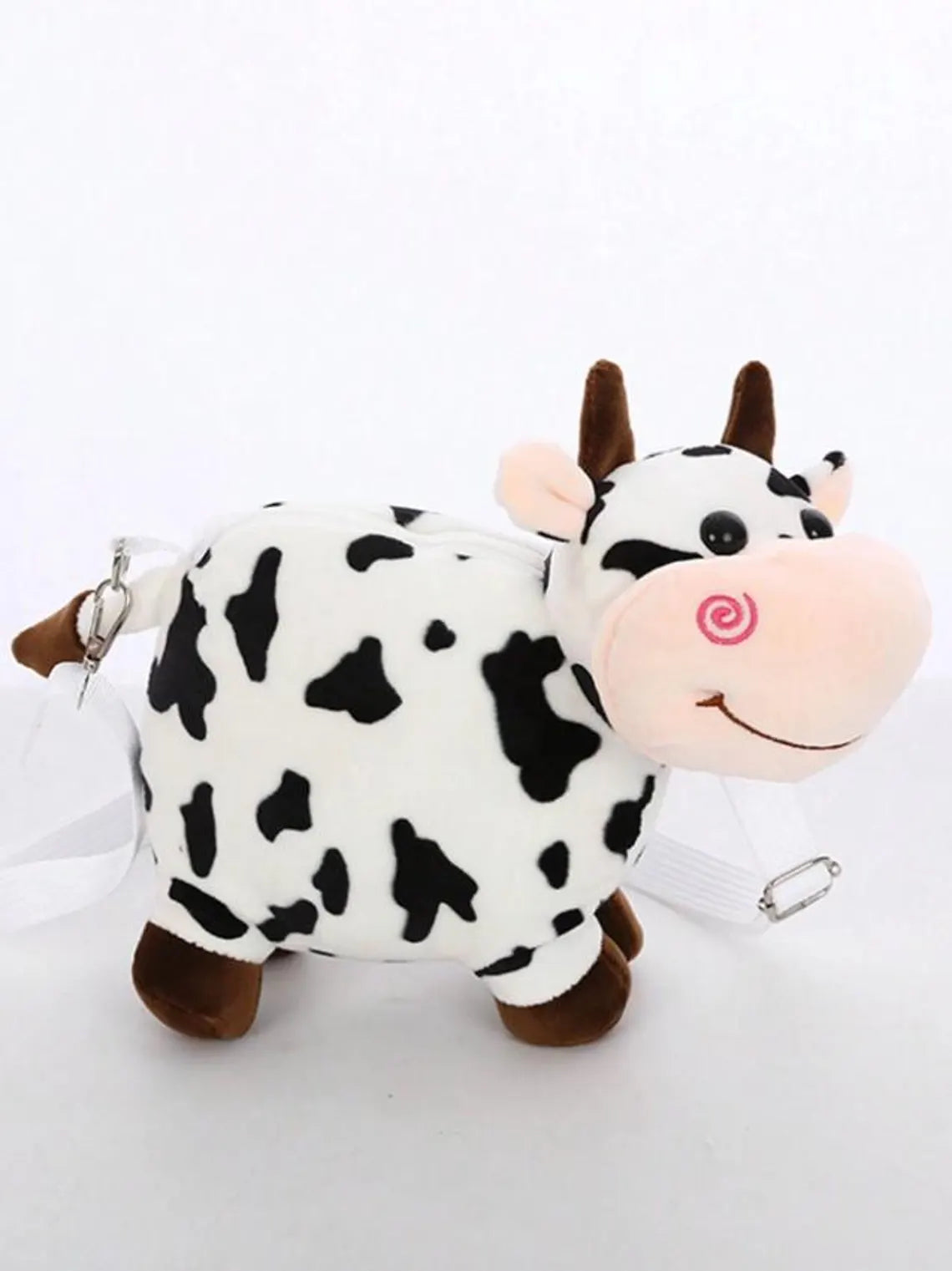 A cross body plushy cow purse